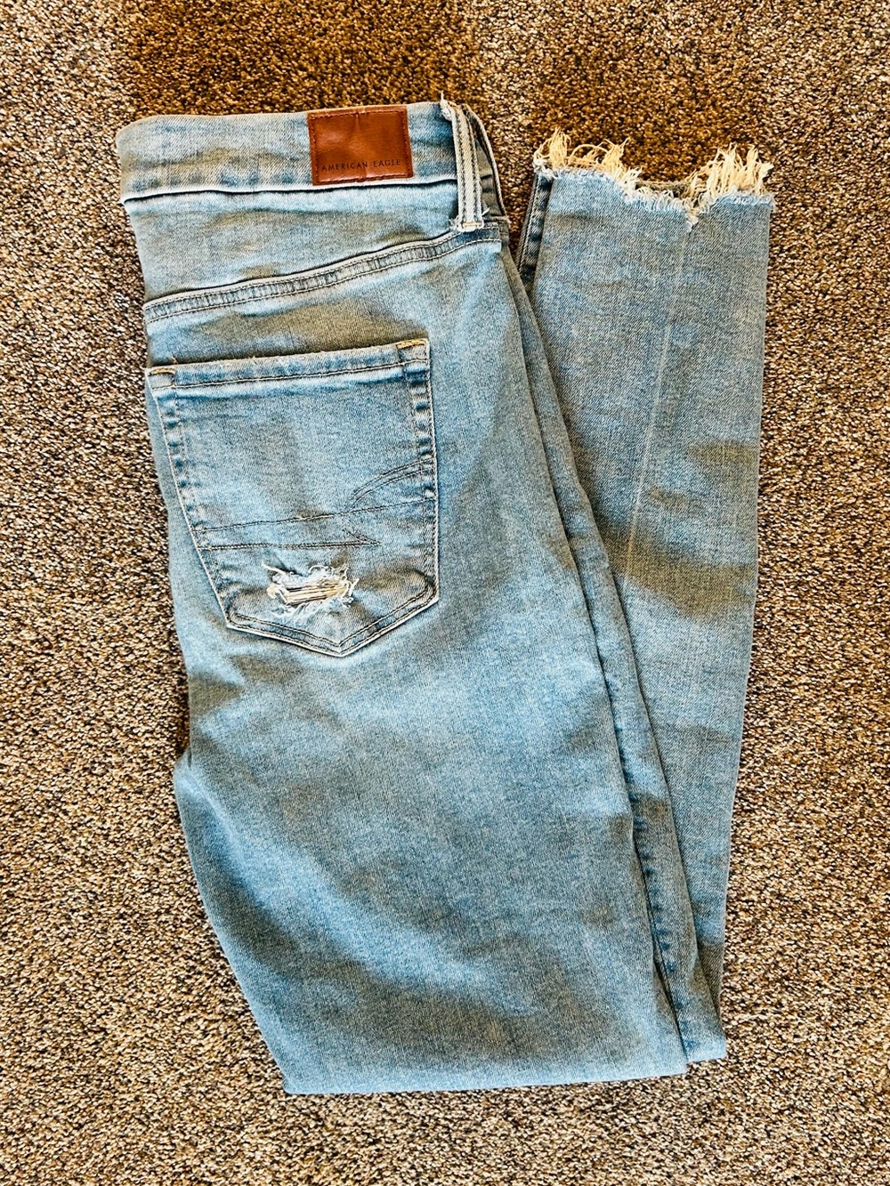 American Eagle Outfitters Light Blue Skinny Jeans with Raw Hem